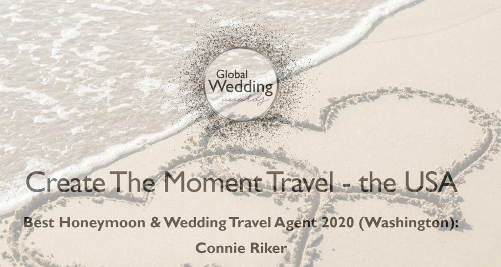 LUX Life Magazine Global Wedding Awards - Awards the Best Honeymoon & Wedding Travel Agent Award (Washington) to Create The Moment Travel & Connie Riker.  Text is over an image of the waterline on the beach with 2 intertwined hearts drawn in the sand.